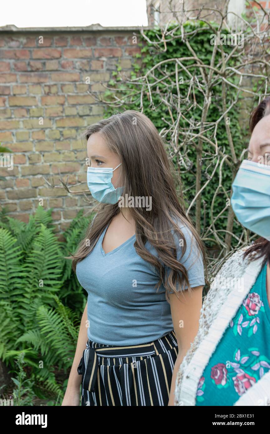 Two young women with face masks hi-res stock photography and images - Alamy