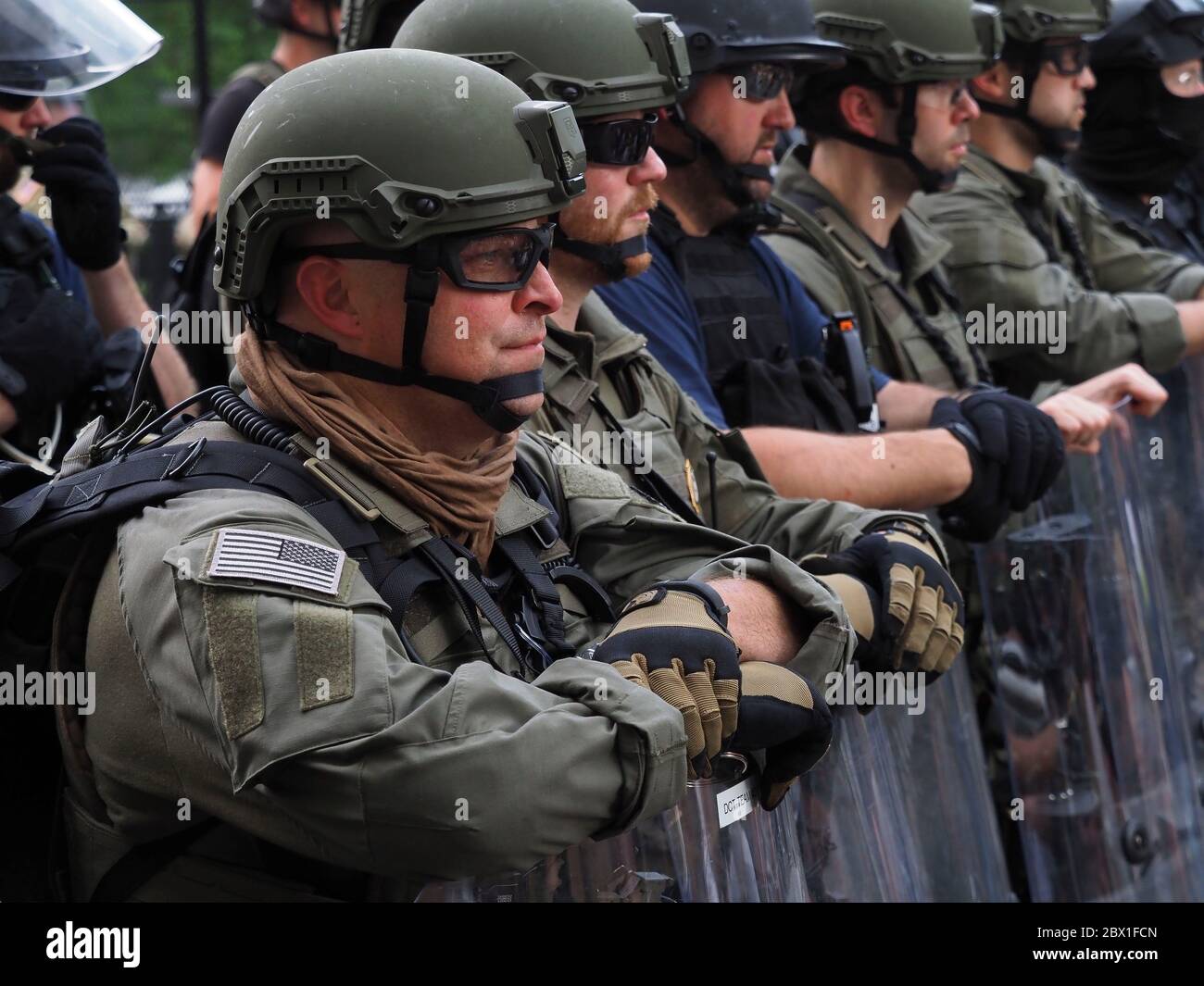 Washington, District of Columbia, USA. 3rd June, 2020. Members of the Bureau of Prisons Disturbance Control Team form a corridor to prevent protesters from assembling in front of Lafayette Park, the location of Monday nightÃs tear gassing. The BoP DCT mission normally is to control riots in prisons. Credit: Sue Dorfman/ZUMA Wire/Alamy Live News Stock Photo