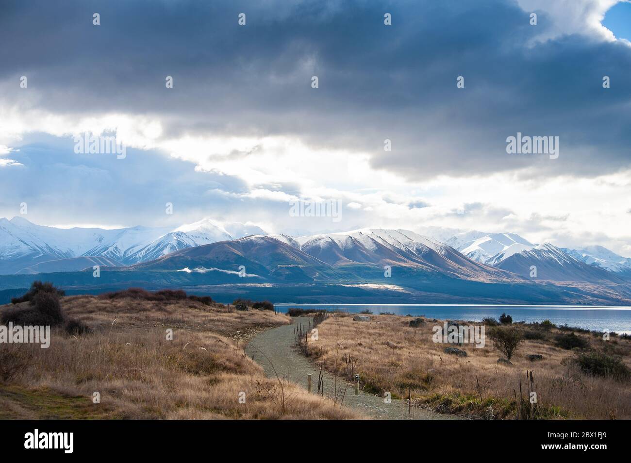 Picturesque View Of Lake Pukaki The Southern Alps And Mount Cook National Park New Zealand A Footpath Winds Through A Winter Landscape Stock Photo Alamy Picturesque View Of Lake Pukaki The Southern Alps And Mount Cook National Park New Zealand A Footpath Winds Through A Winter Landscape Stock Photo Alamy