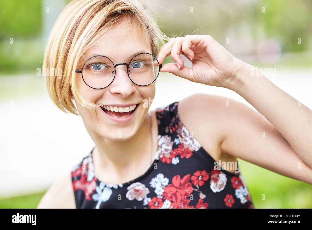 Beautiful young woman glasses hi-res stock photography and images - Alamy
