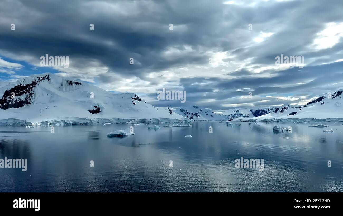 Elephant Islands with several icebergs and a dramatic sky. Stock Photo