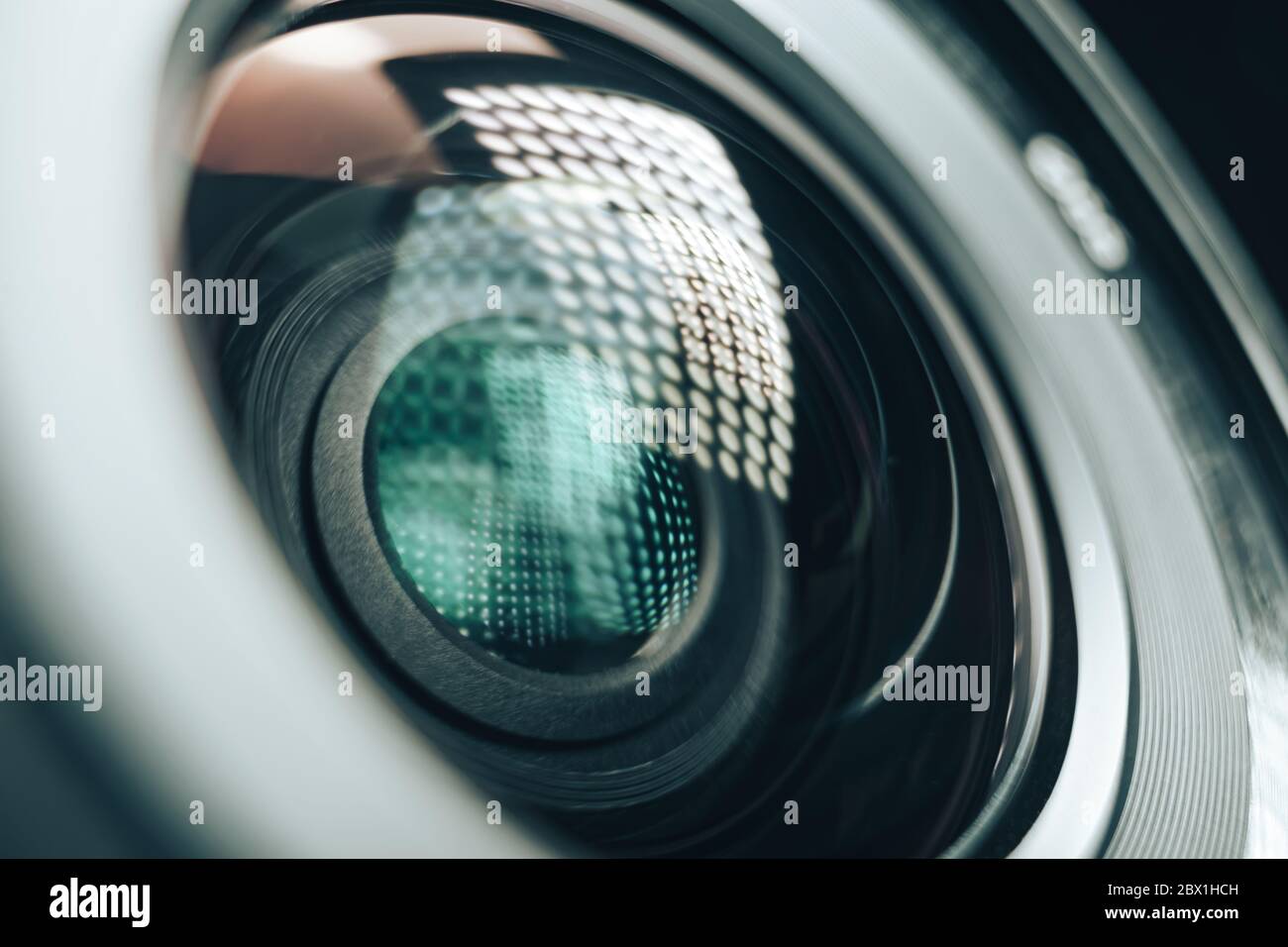 Close up beautiful camera aperture lens with multi colored light glass