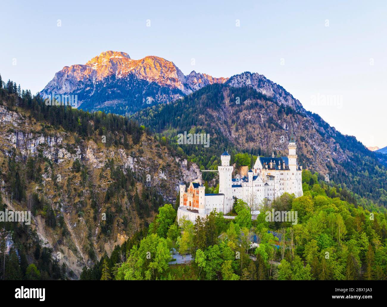 Neuschwanstein Castle, Mountain Saeuling in the morning light, Ammergau Alps, near Schwangau, drone shot, East Allgaeu, Allgaeu, Swabia, Bavaria Stock Photo