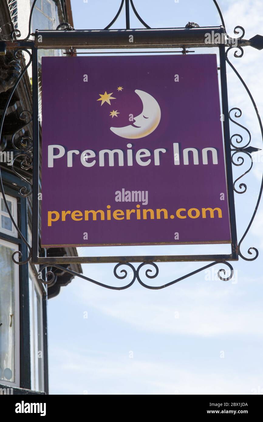 The Premier Inn sign hanging from a hotel in the UK Stock Photo