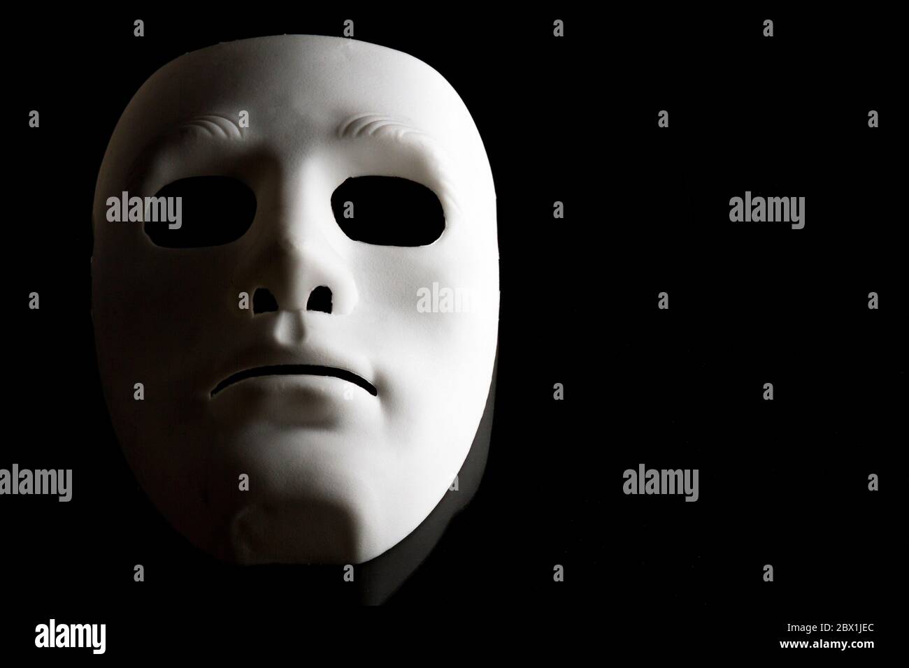 Face mask on black background hi-res stock photography and images - Alamy