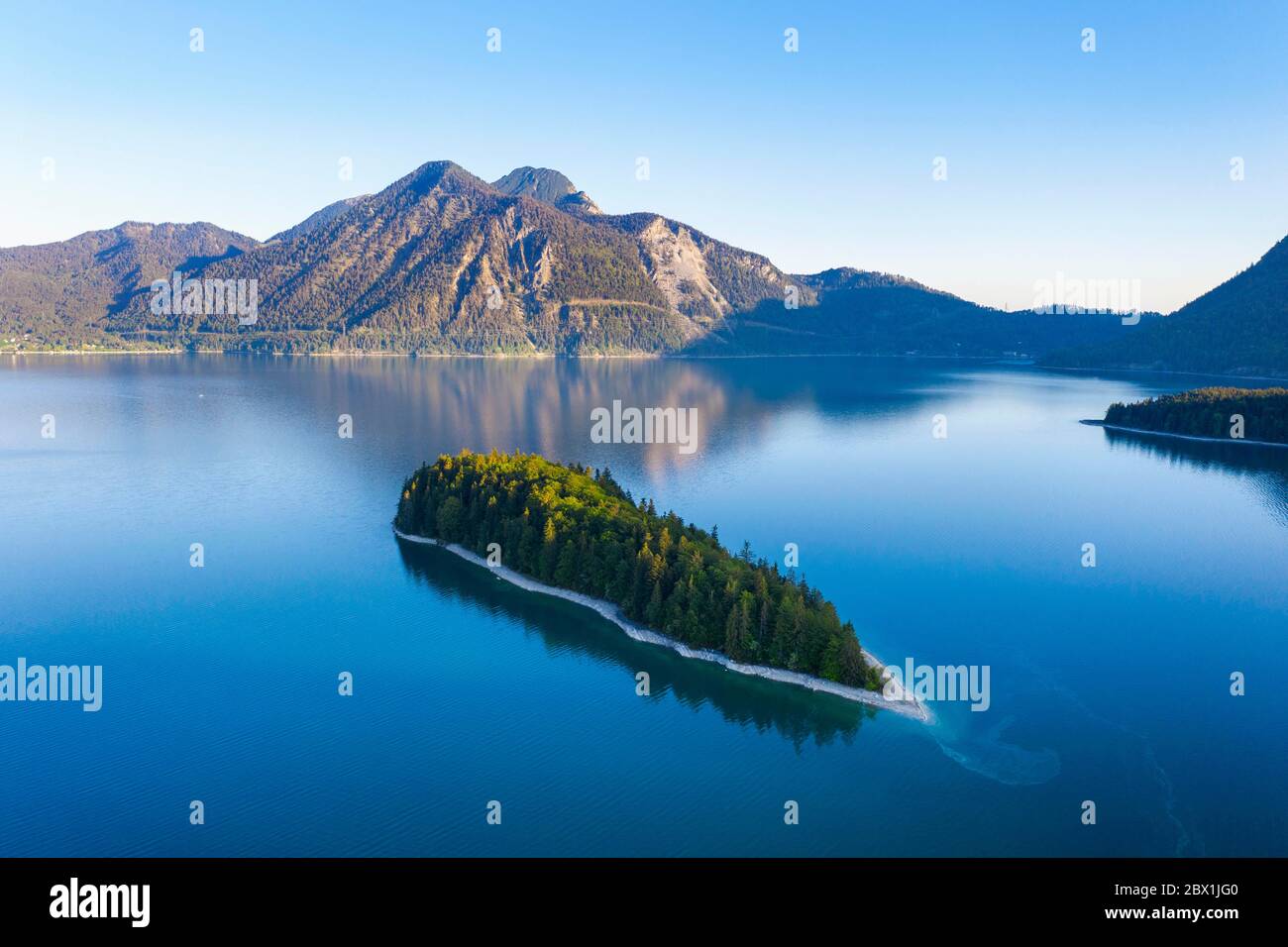 Island Sassau, Lake Walchensee, behind Herzogstand, near Kochel am See, drone shot, Upper Bavaria, Bavaria, Germany Stock Photo
