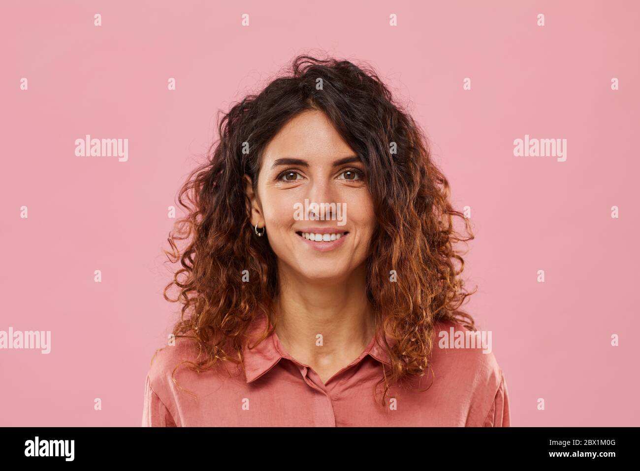 Curly hair woman studio beauty hi-res stock photography and images - Alamy