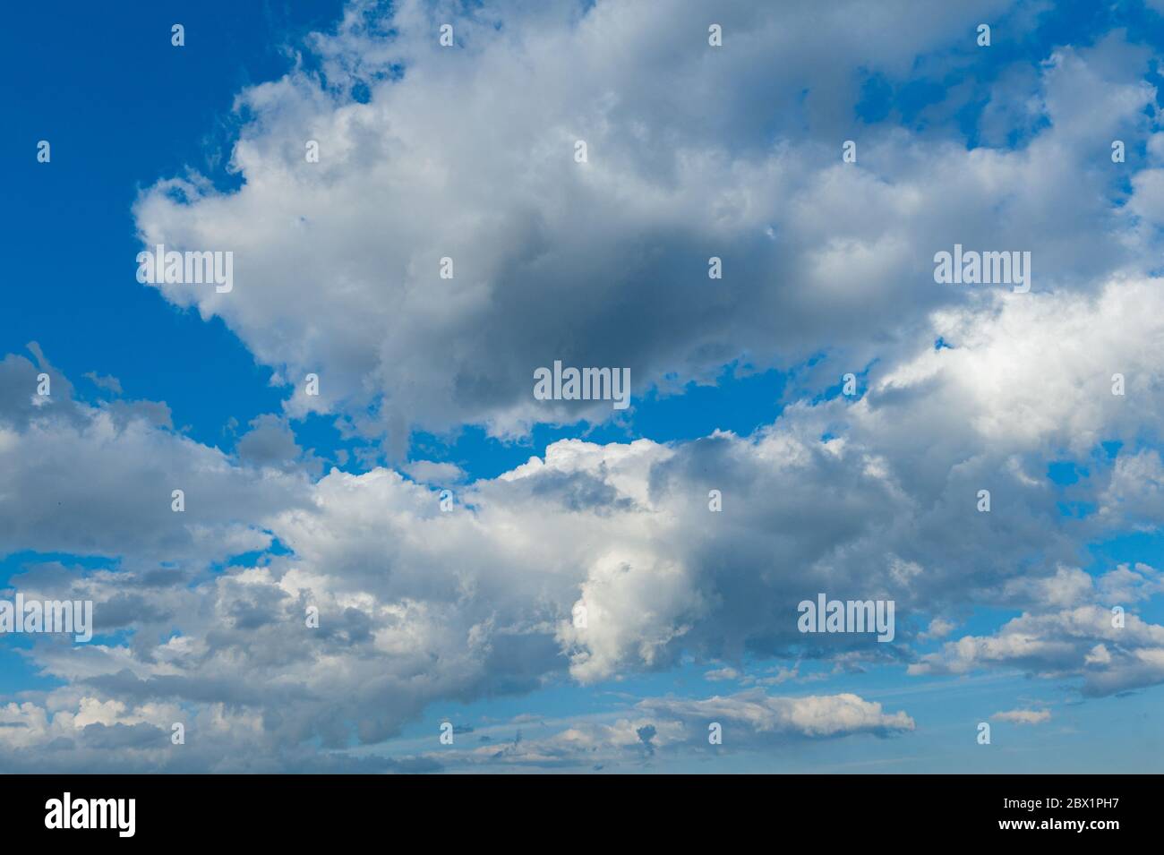 blue sky with clouds closeup. Nature wallpaper Stock Photo - Alamy