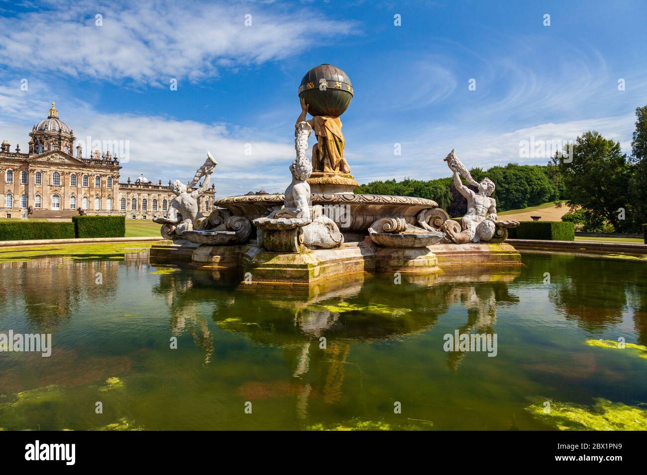 The Atlas Fountain with Castle Howard in the background, Yorkshire, England Stock Photo