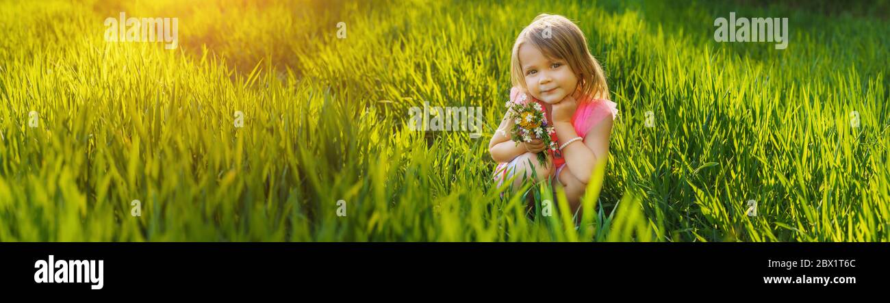 An sweet girl by the blossoming cherry tree. Spring Stock Photo - Alamy