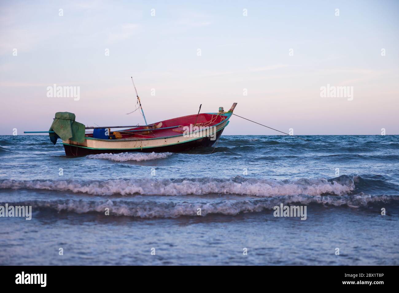 Traditional fishing boat in the sea. Stock Photo