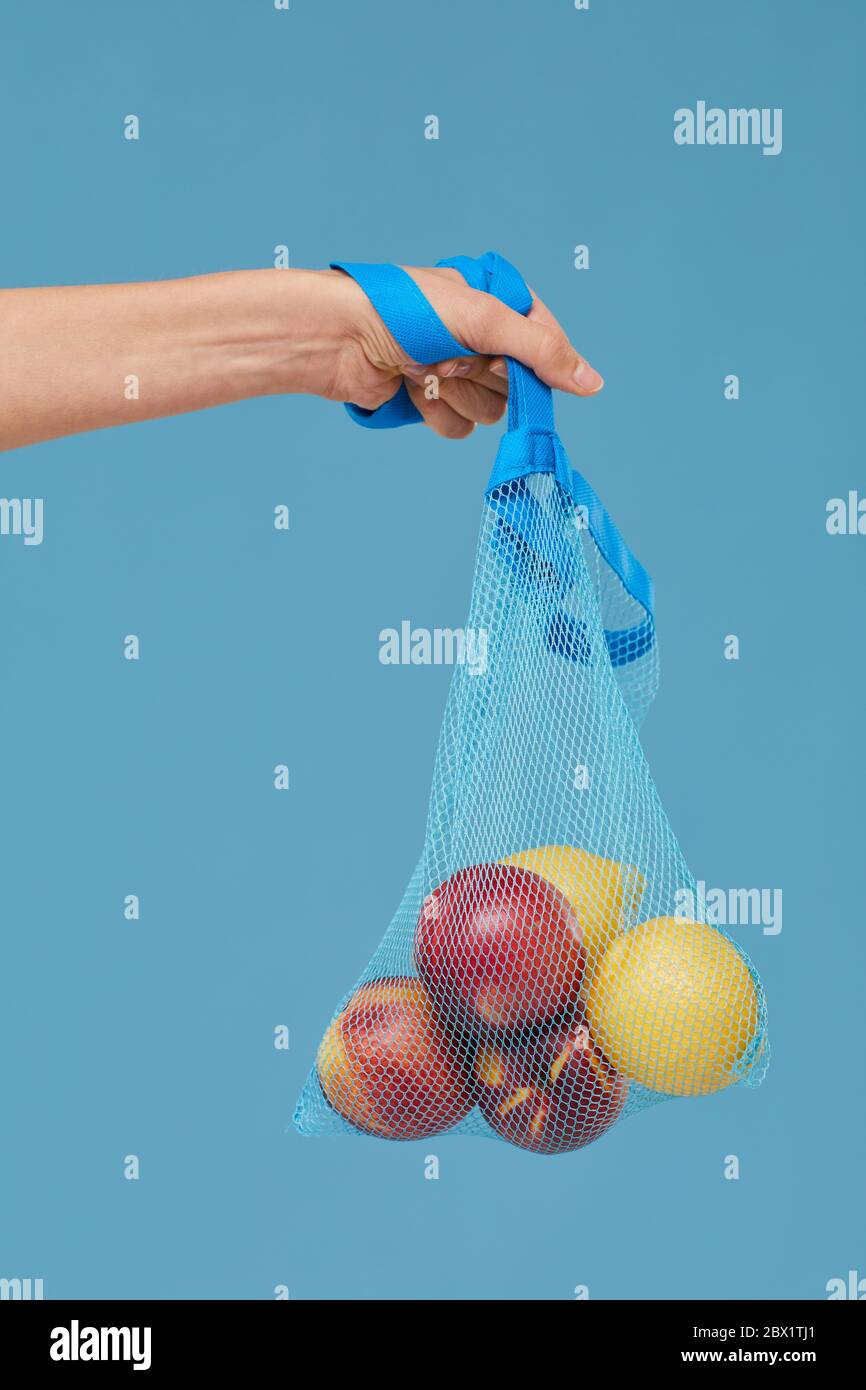 Hand holding bag hi-res stock photography and images - Alamy