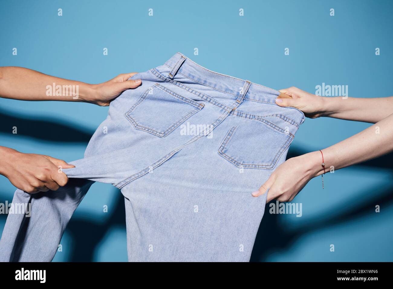 Pulling of jeans hires stock photography and images Alamy