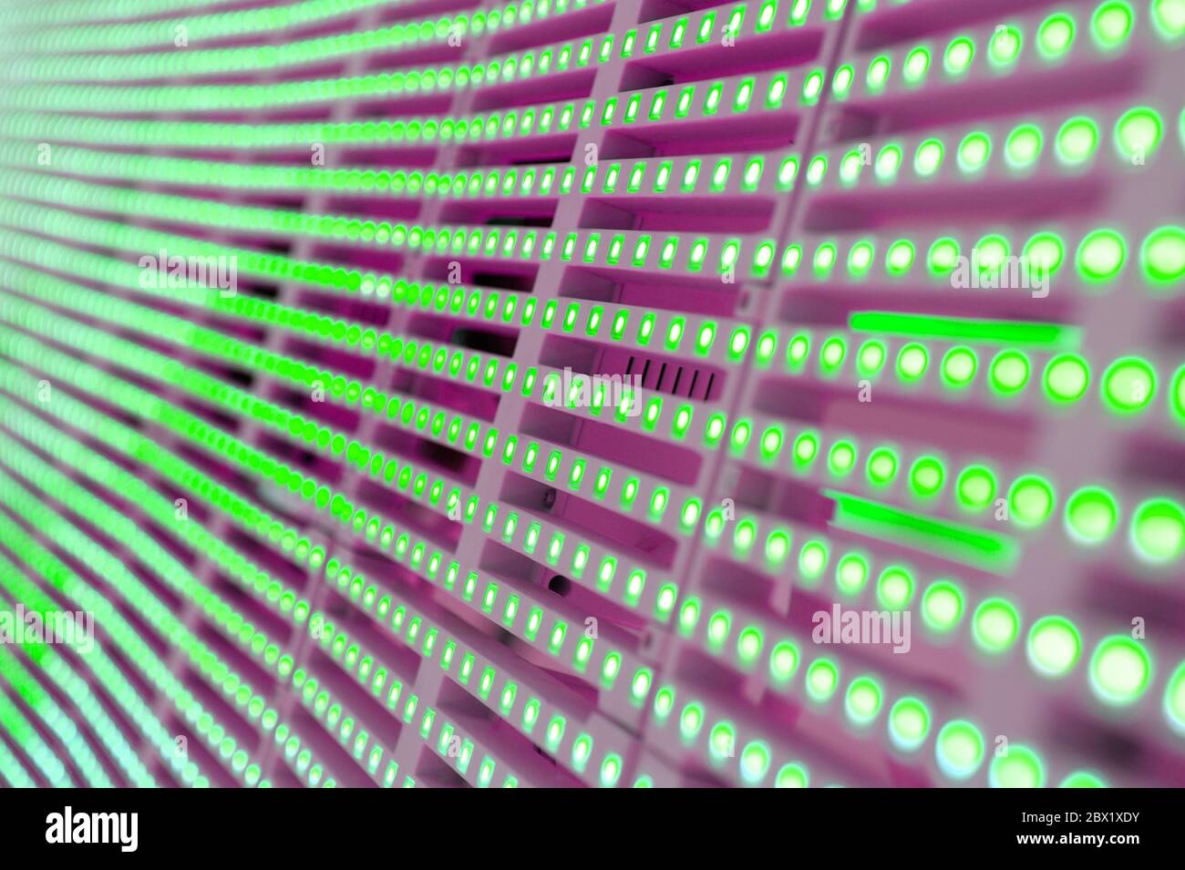 Rows and columns of colorful LED changing colors, looking futuristic ...