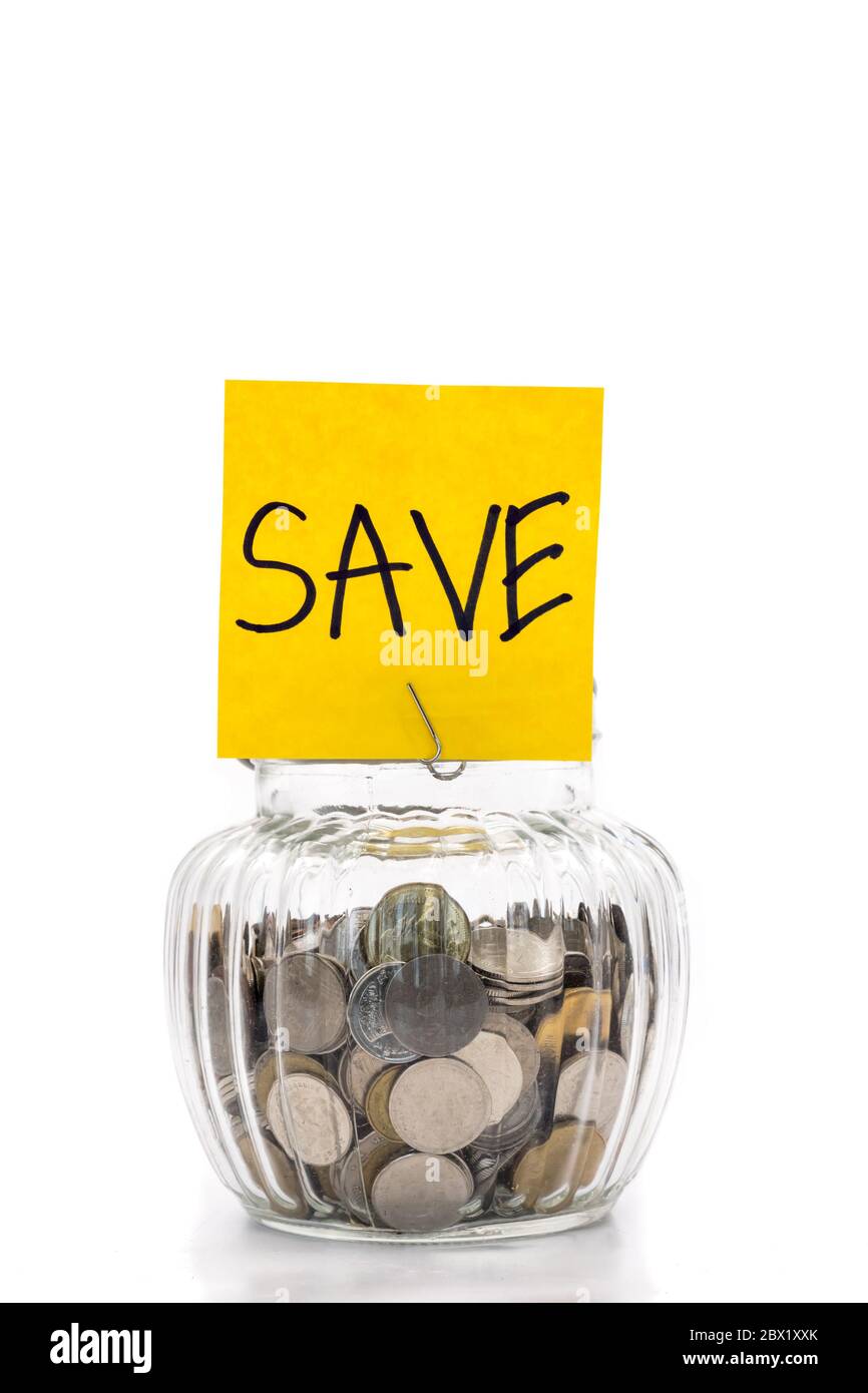 Coins in glass bottle on white background, saving money for Future