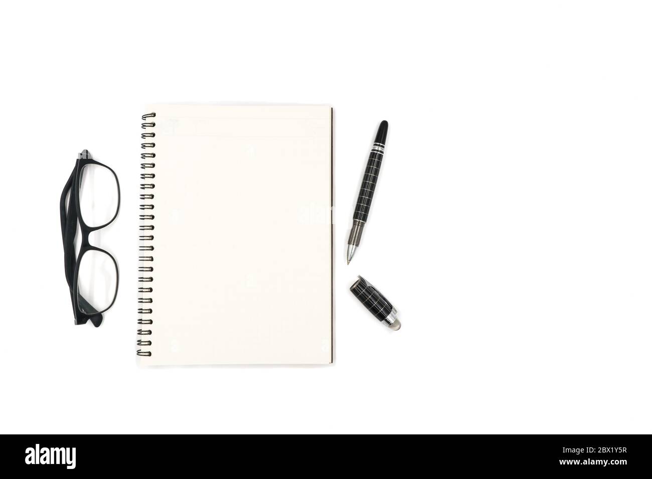 Top view of Notebook with pen and glasses on white background Stock ...