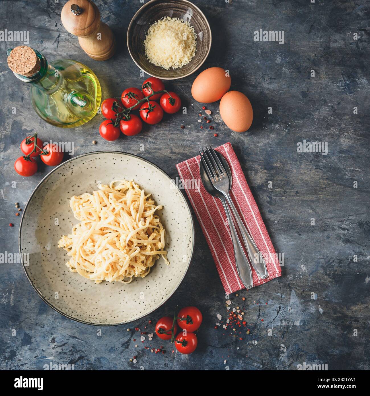 Pasta Linguine with scrambled eggs and parmesan cheese. Traditional