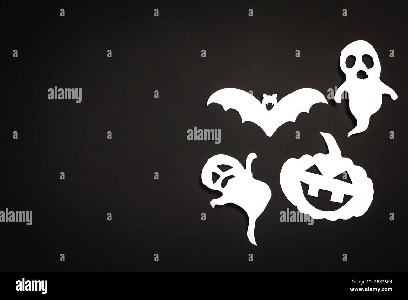 Halloween Holiday Background With Pumpkin Ghosts And Bat Cut Paper On Black Background Free Space For Text Stock Photo Alamy
