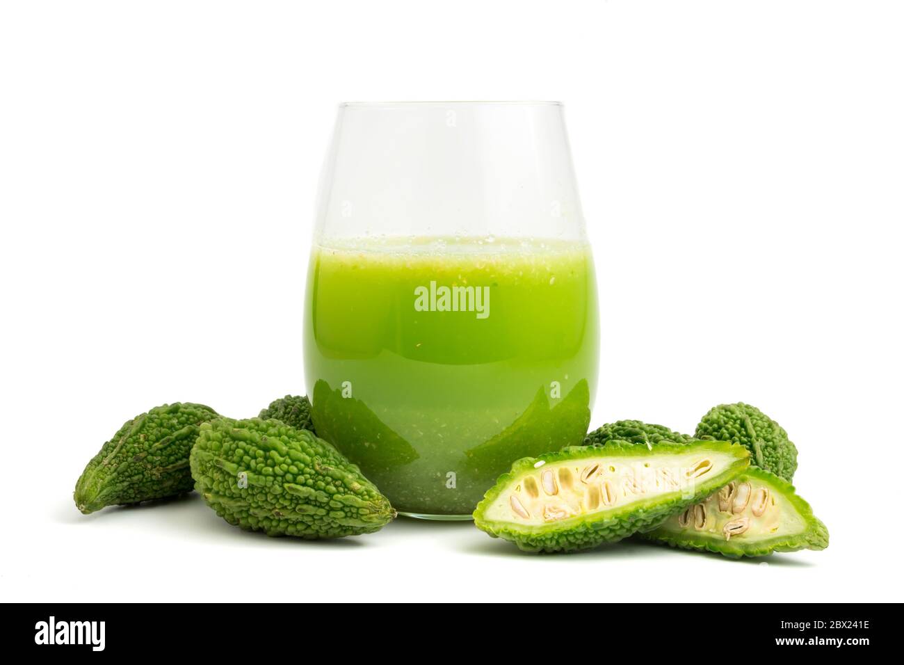 Herbal juice with bitter melon or bitter gourd on white background
