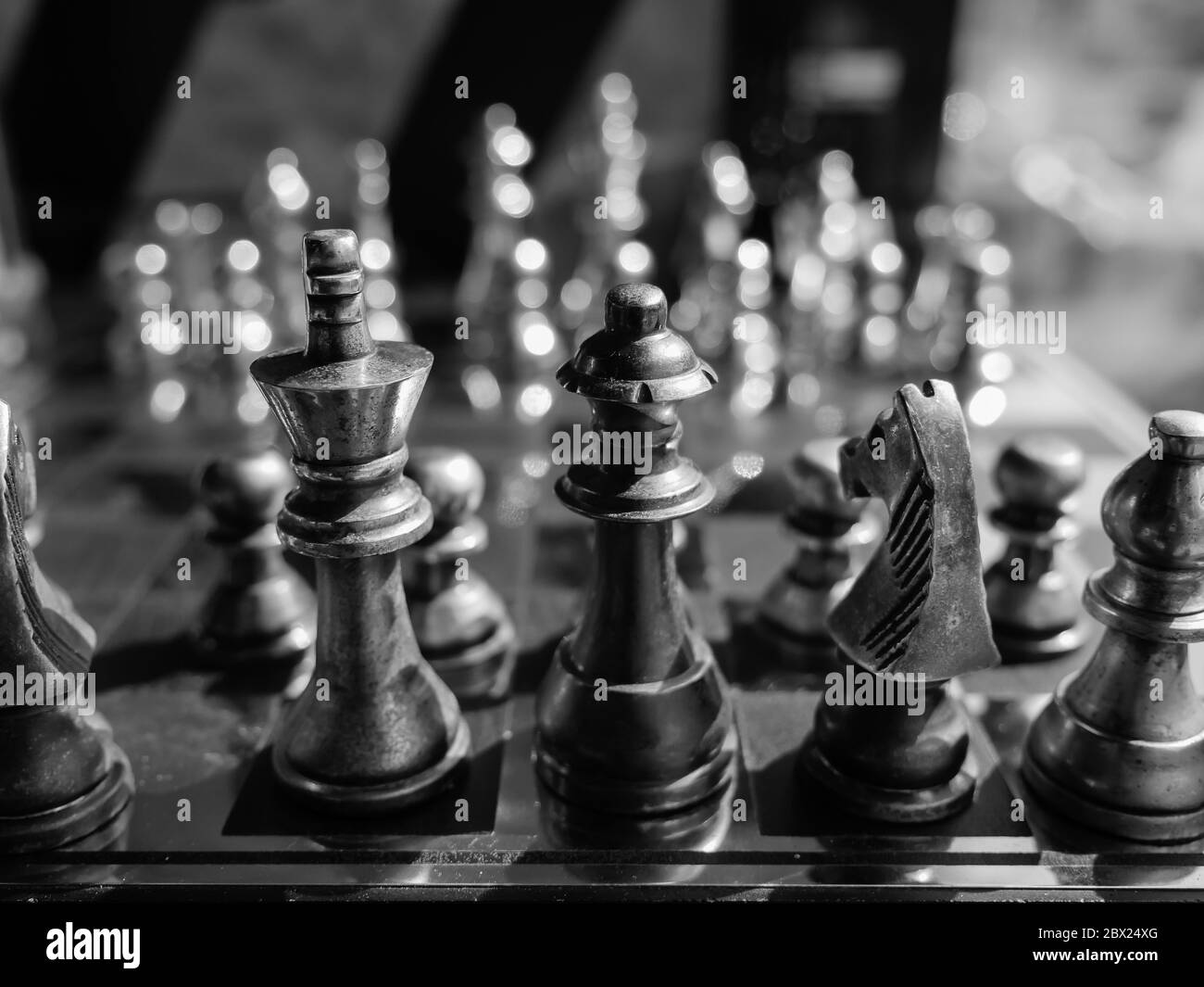 Chess pieces with chess board.Selective focus.black and white filter. Stock Photo