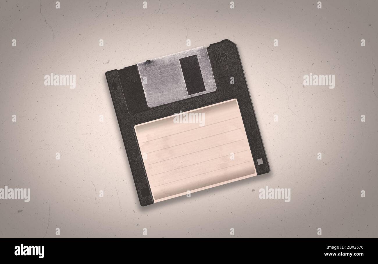 A retro vaporwave themed old black aged floppy disk illustration background with copy space Stock Photo