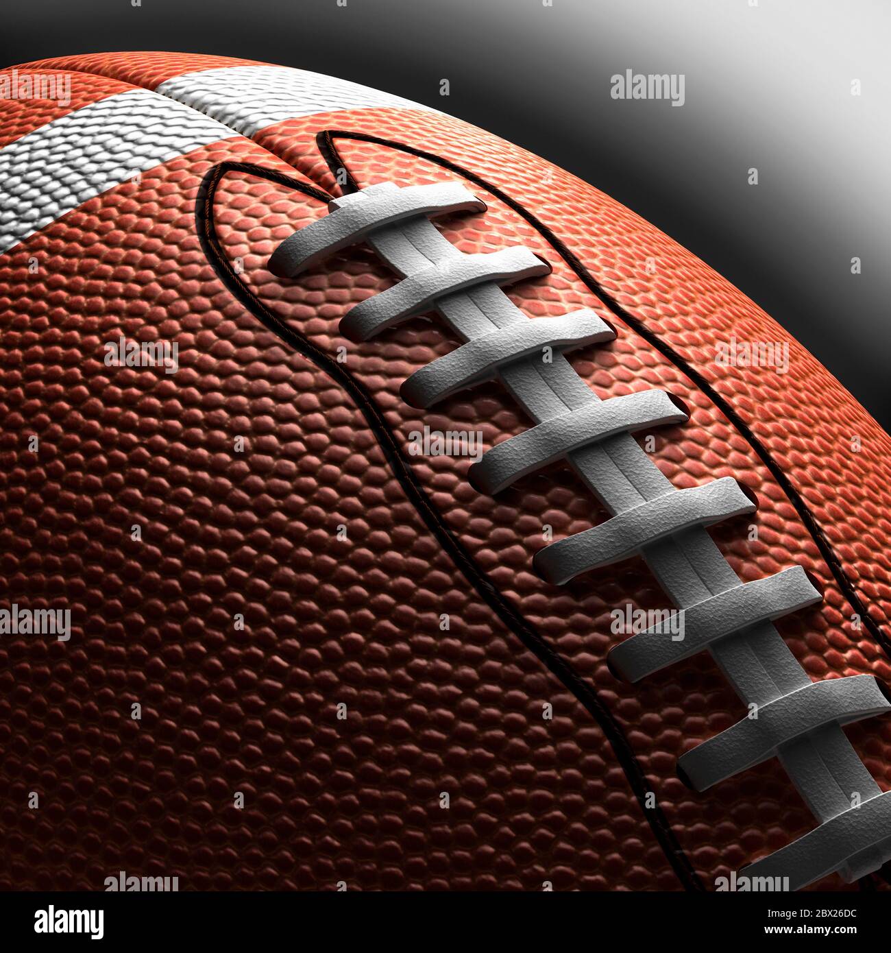 American Football close up isolated. Studio still life. Grey gradated Background. cut out Stock Photo