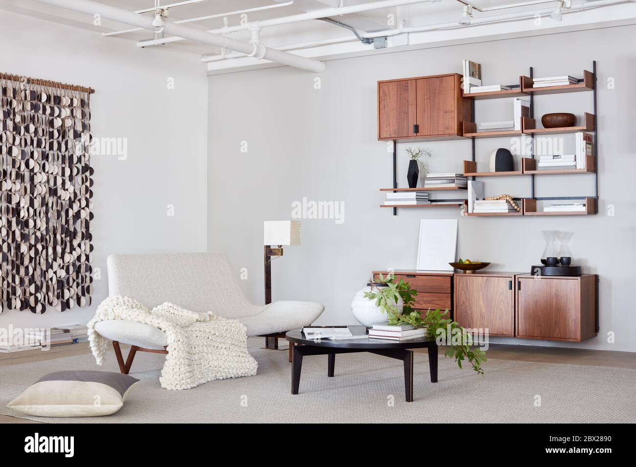 Modern, clean livingroom loft space with bespoke furnishings Stock Photo