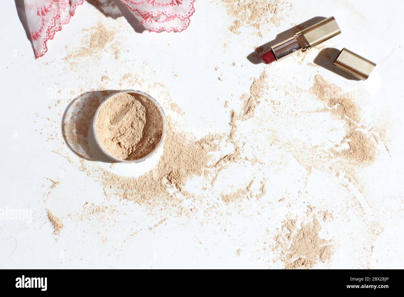 Still life of lipstick powder spill Stock Photo Alamy