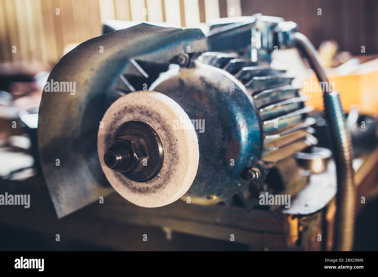 Electric motor in the workshop - grindstone - locksmith Stock Photo - Alamy
