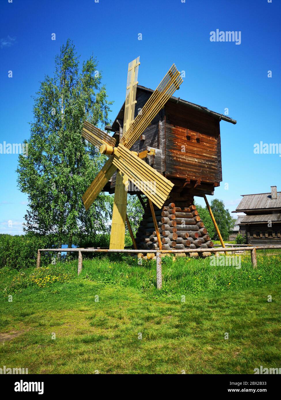 Windmill made of wood in Russia Stock Photo