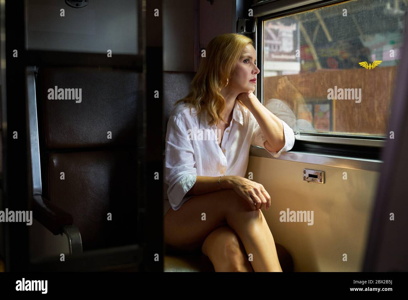 Mature woman on train station hi-res stock photography and images - Alamy