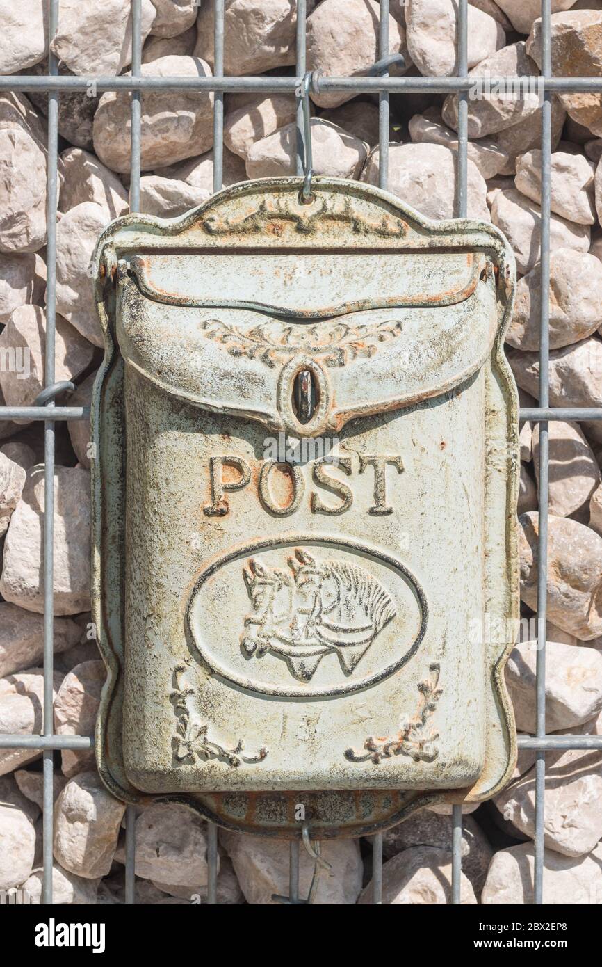 Old vintage austrian metal mailbox decorated with ornaments and horses ...