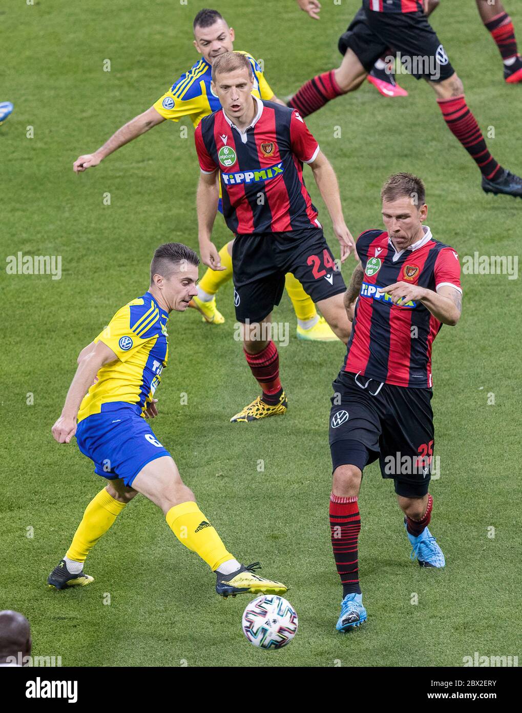 Lyes Houri of MOL Fehervar FC challenges David Siger of