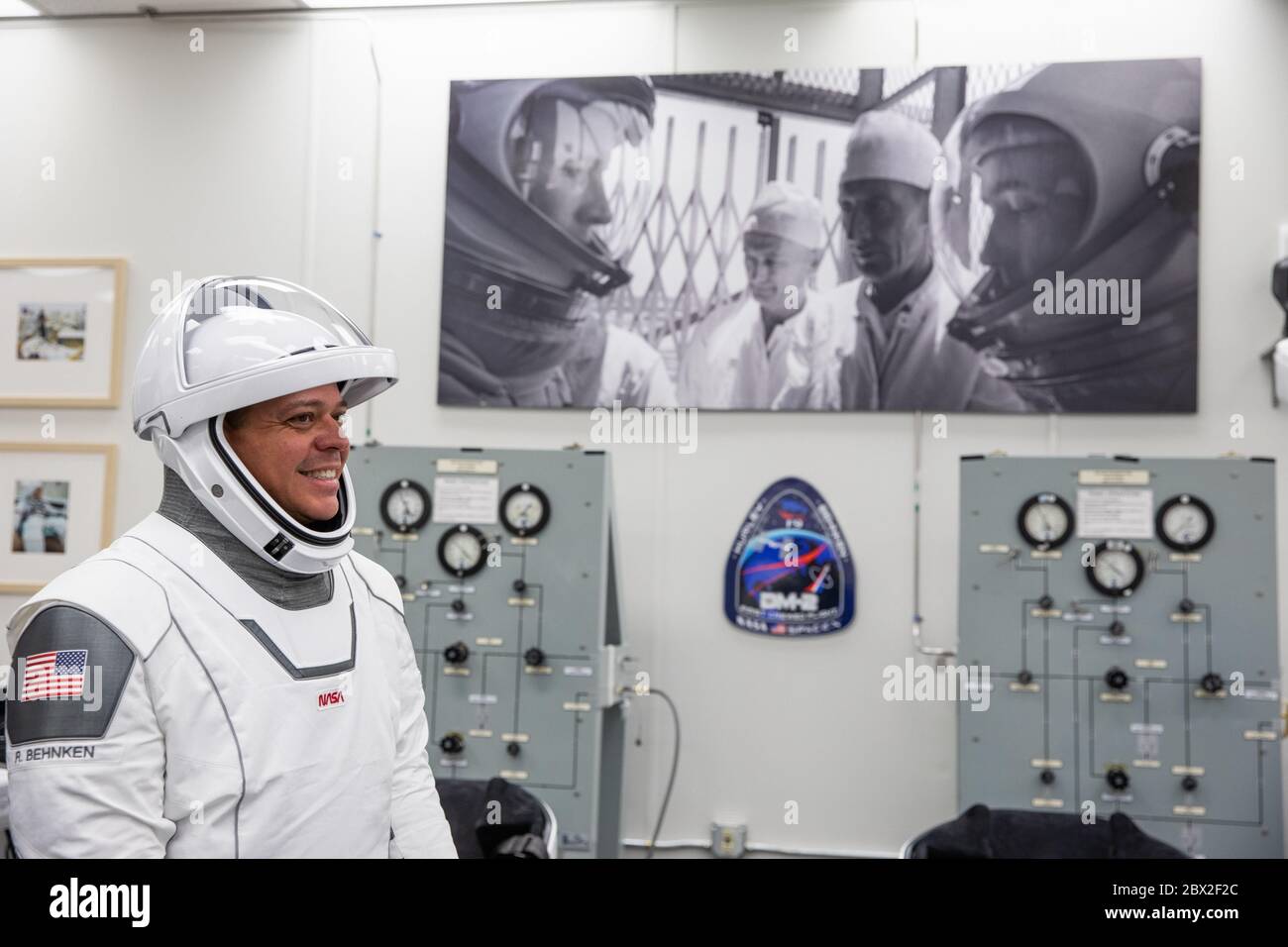 NASA astronaut Robert Behnken, smiles as he suits-up in his SpaceX spacesuit, in the ready room of the Neil Armstrong Operations and Checkout Building at the Kennedy Space Center May 30, 2020 Cape Canaveral, in Florida. The astronauts Behnken and Hurley will make a second attempt at launch in the first commercial launch carrying astronauts to the International Space Station. Stock Photo