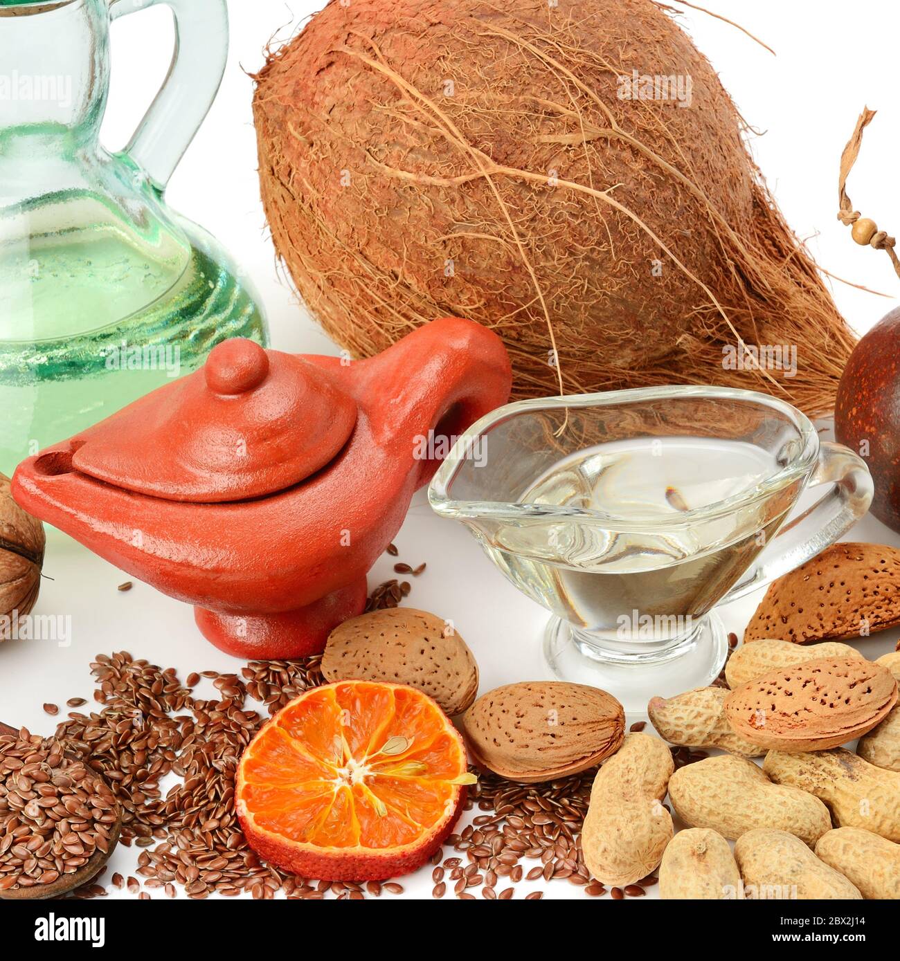 Set of seeds, nuts and vegetable oils, isolated on white background