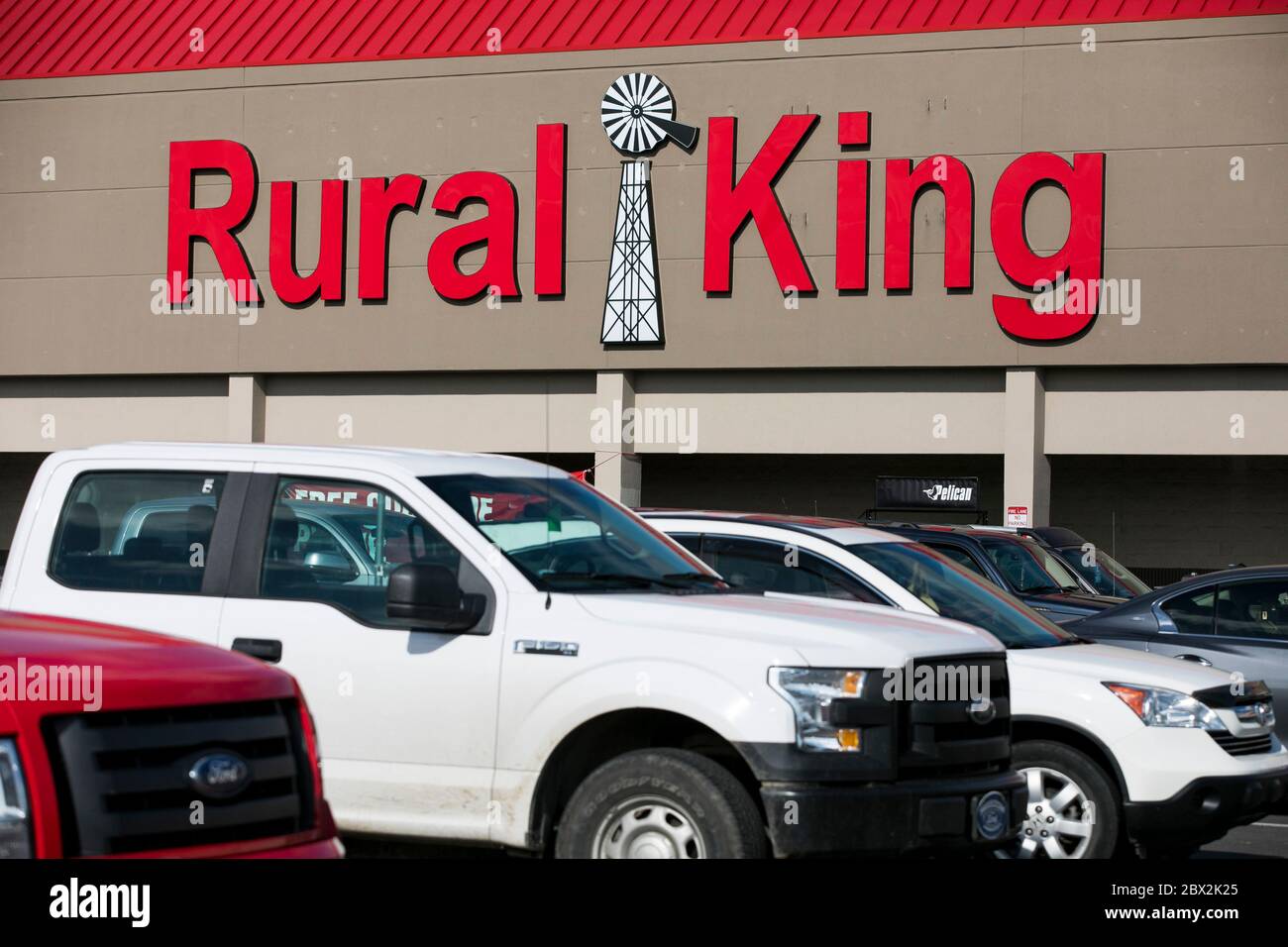 A logo sign outside of a Rural King Supply retail store location in