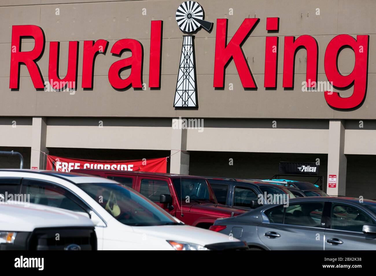 A logo sign outside of a Rural King Supply retail store location in