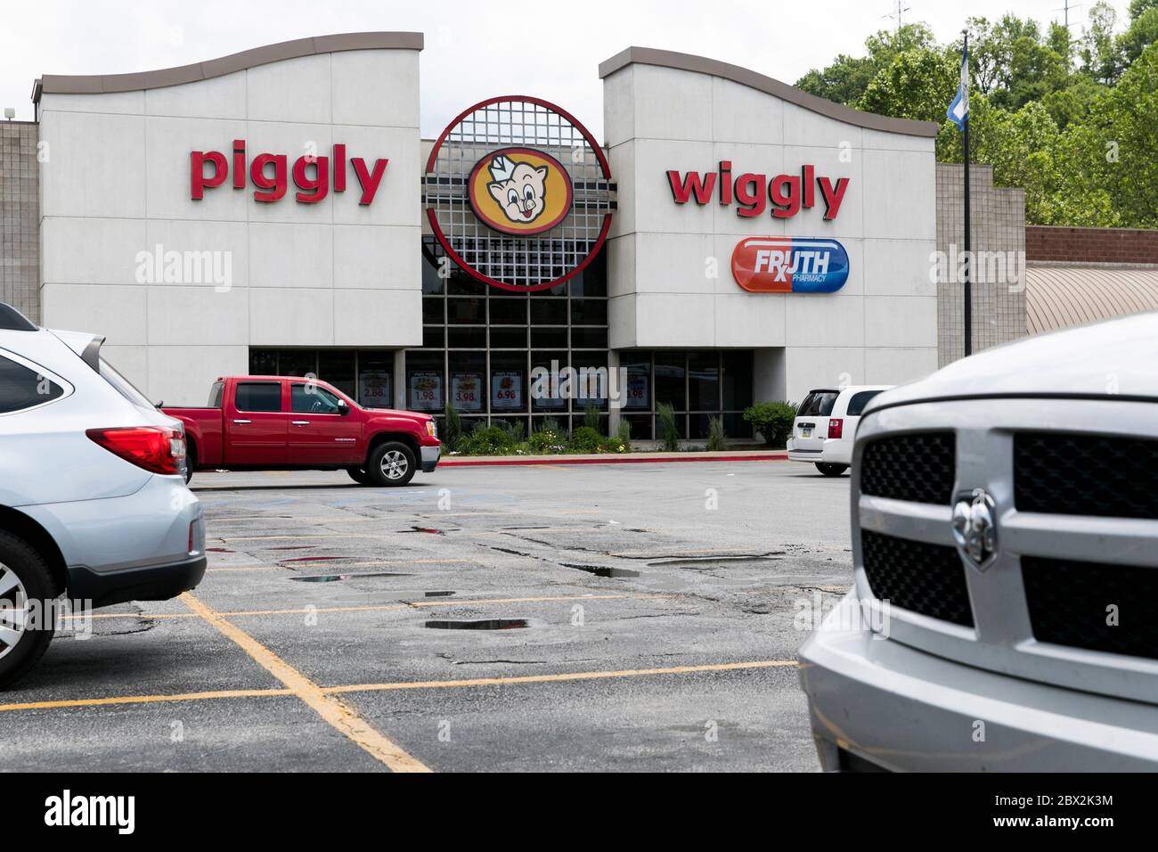 A logo sign outside of a Piggly Wiggly retail grocery store location in Charleston, West Virginia on May 29, 2020. Stock Photo