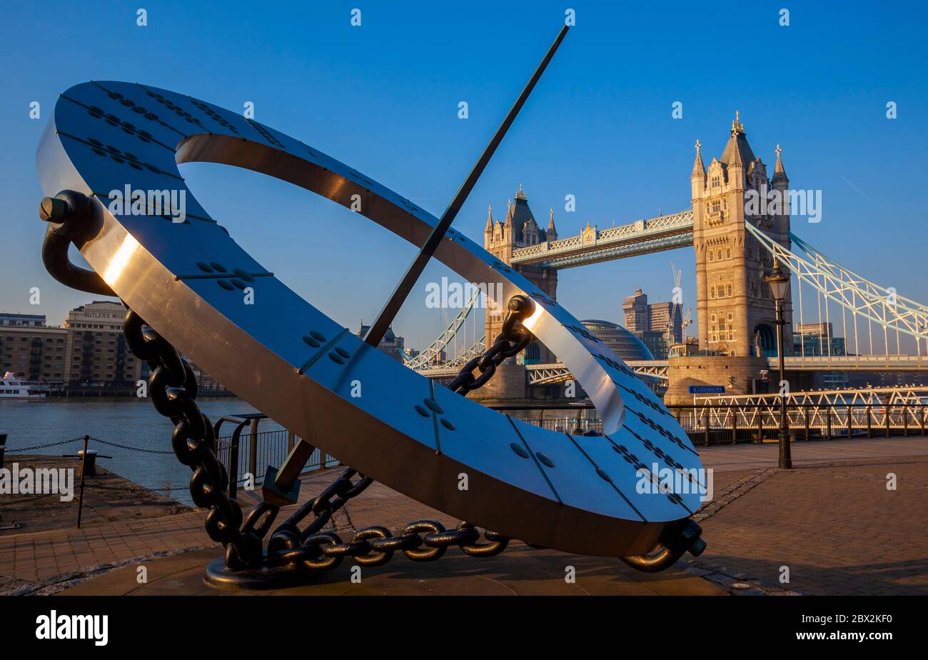 Timepiece Sculpture and Tower Bridge, London, England, UK Stock Photo ...
