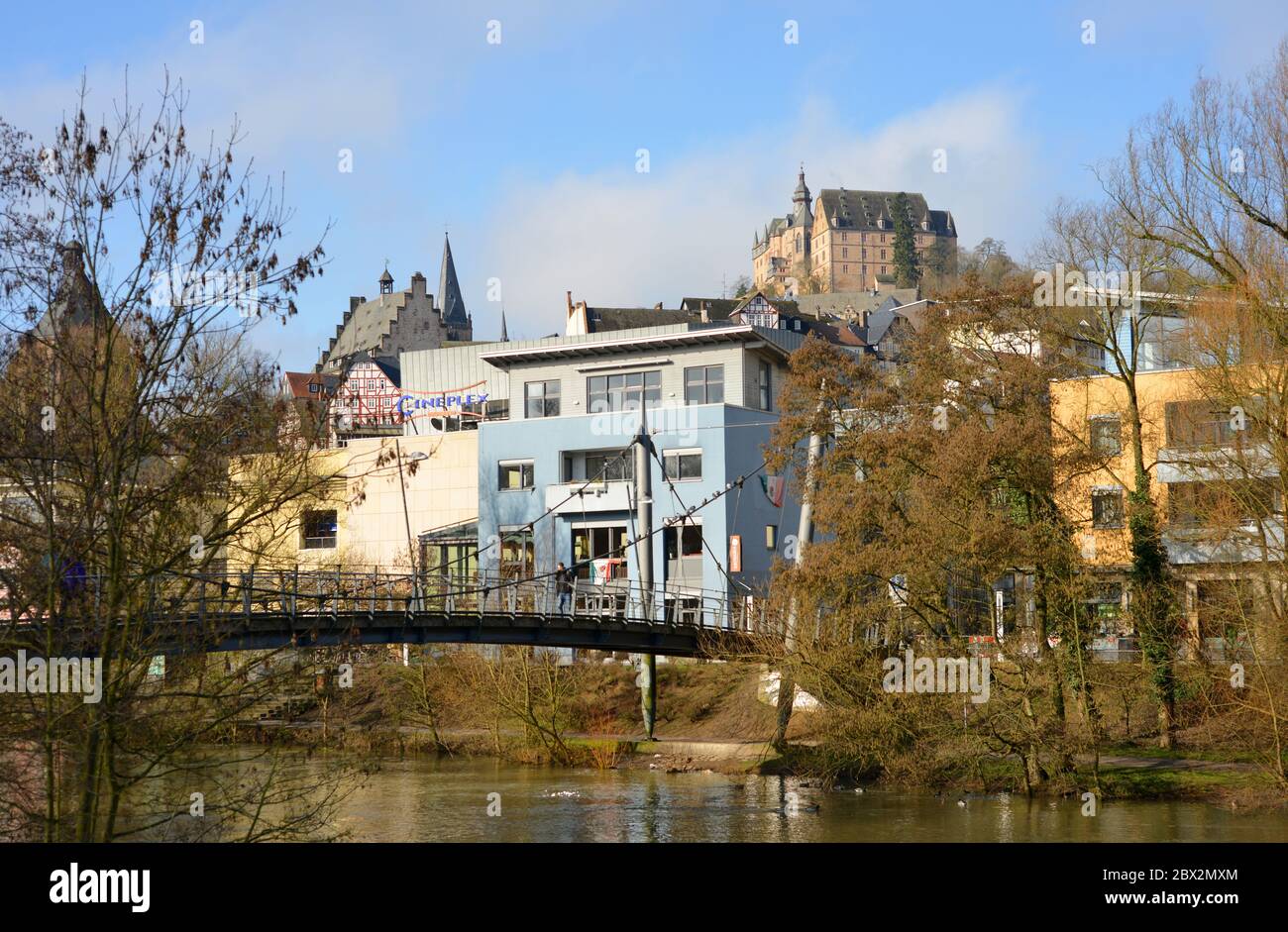 Marburg, Germany, 02-12-2016 bridge over the Lahn river, view to the town center and the castle Stock Photo