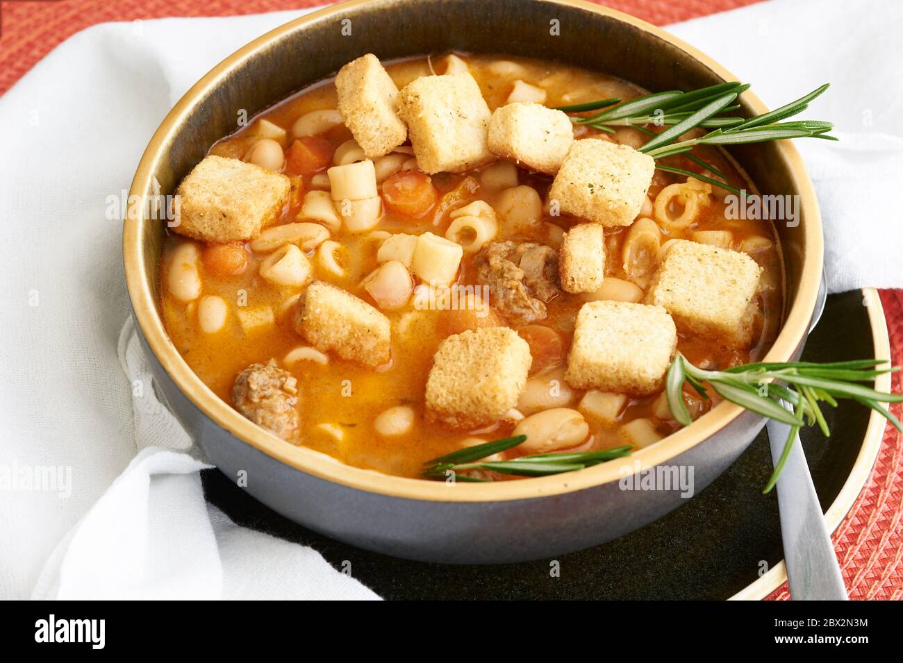 Pasta Fagioli authentic Italian soup made with beans, pasta and sausage. Stock Photo