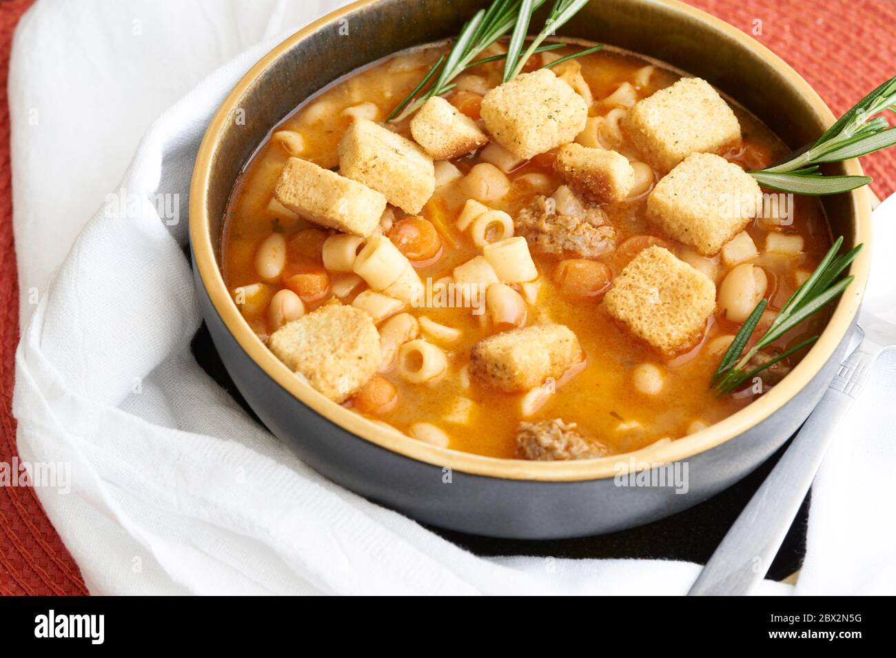 Pasta Fagioli authentic Italian soup made with beans, pasta and sausage. Stock Photo