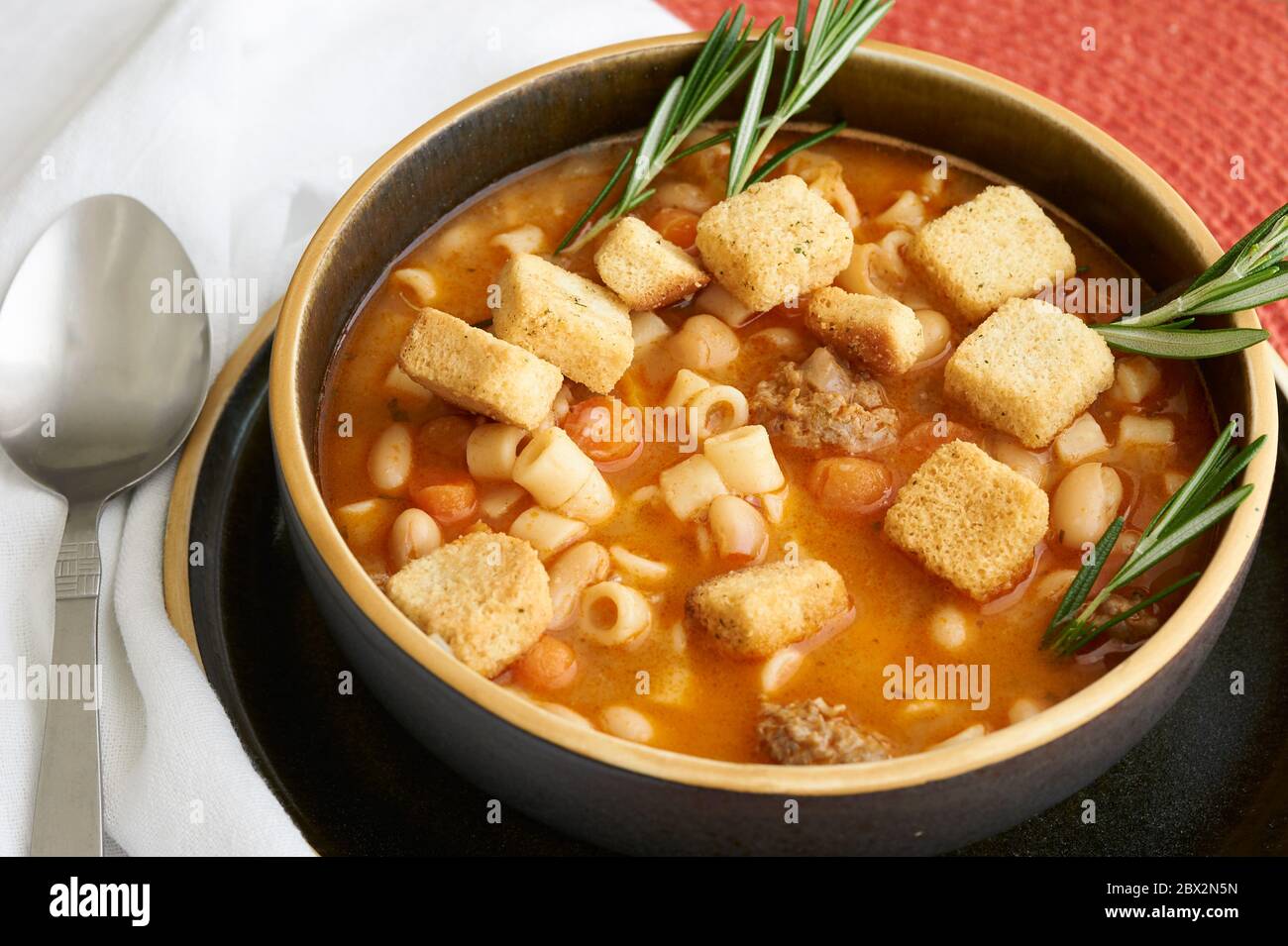 Pasta Fagioli authentic Italian soup made with beans, pasta and sausage. Stock Photo
