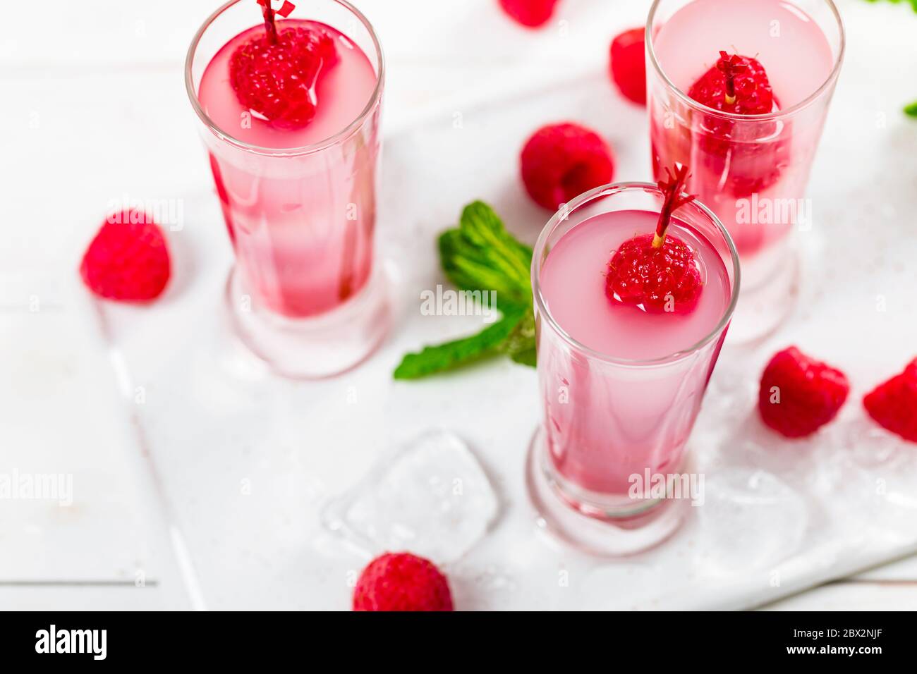 Raspberry Vodka Shots Lemonade Cocktail with Fresh Raspberry on White ...