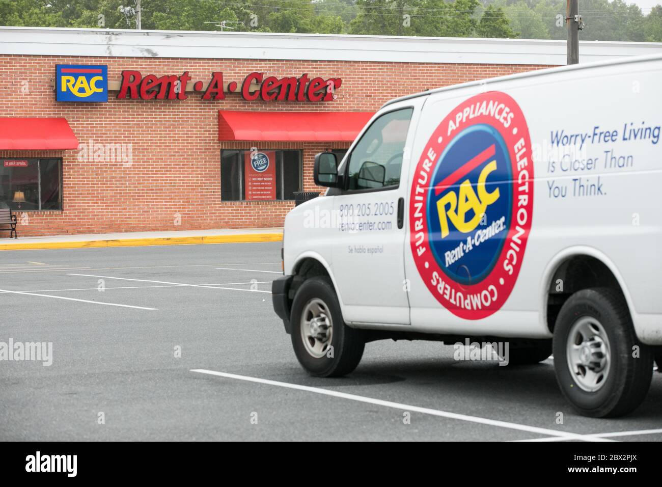 A logo sign outside of a Rent-A-Center store location in Seaford, Delaware on May 25, 2020. Stock Photo