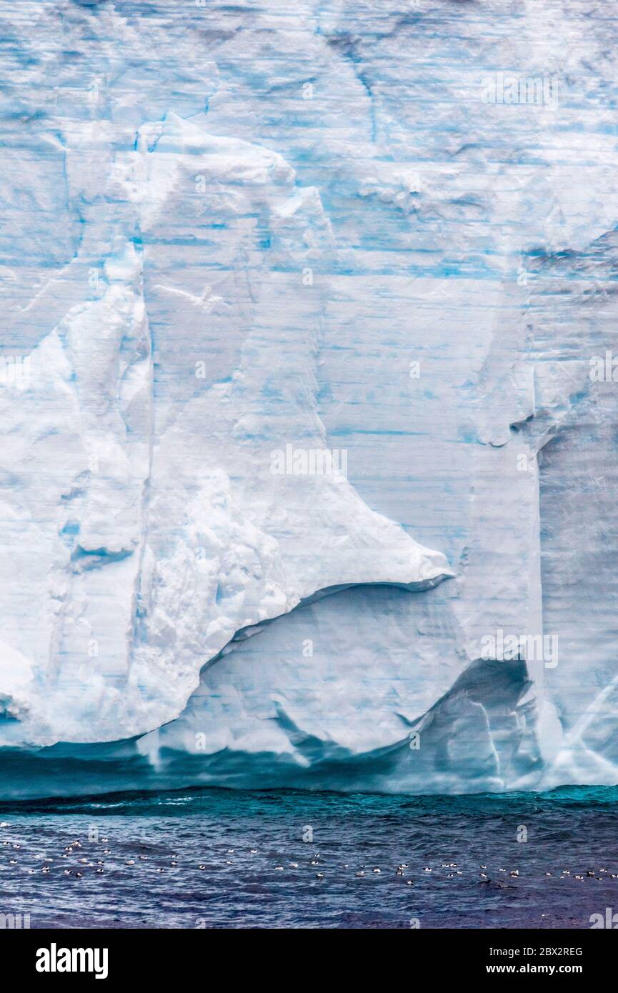 Antarctica, Southern Ocean, tabular iceberg, each blue or white stratum ...