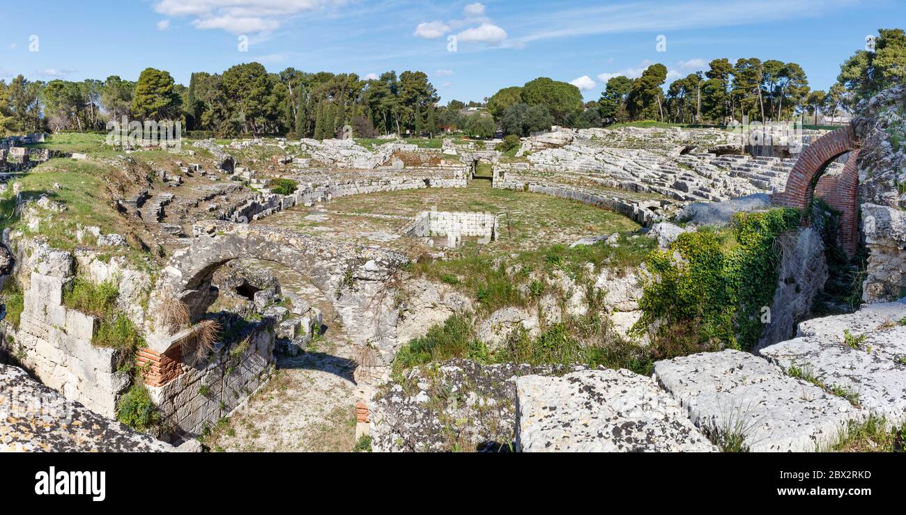Italy, Sicily, Syracuse, The Neapolis archeological Park listed as World  Heritage by UNESCO, the Roman amphitheater Stock Photo - Alamy