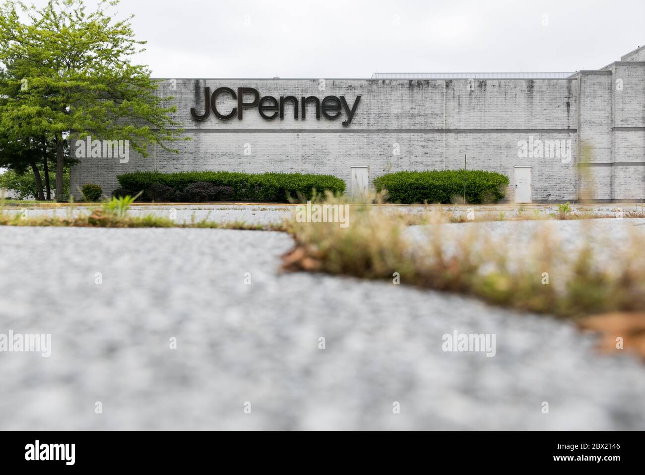 A logo sign outside of a JCPenney retail store location in Dover, Delaware on May 25, 2020. Stock Photo