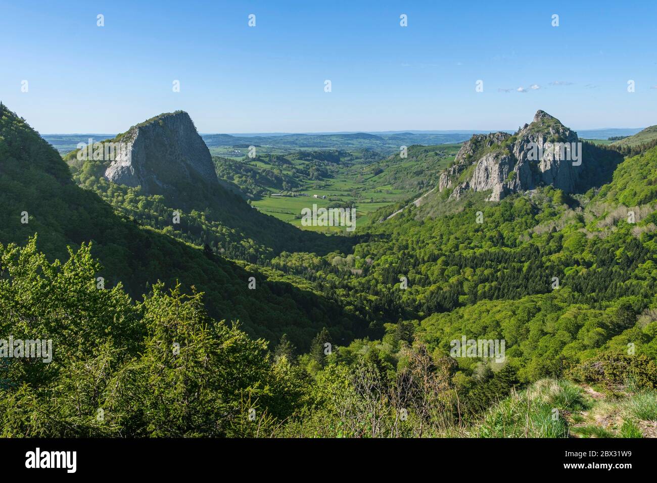 France, Puy de Dome, regional natural park of Auvergne volcanoes, Monts Dore, col de Guéry, roches Tuiliere (left) and Sanadoire (right), two volcanic protrusions Stock Photo