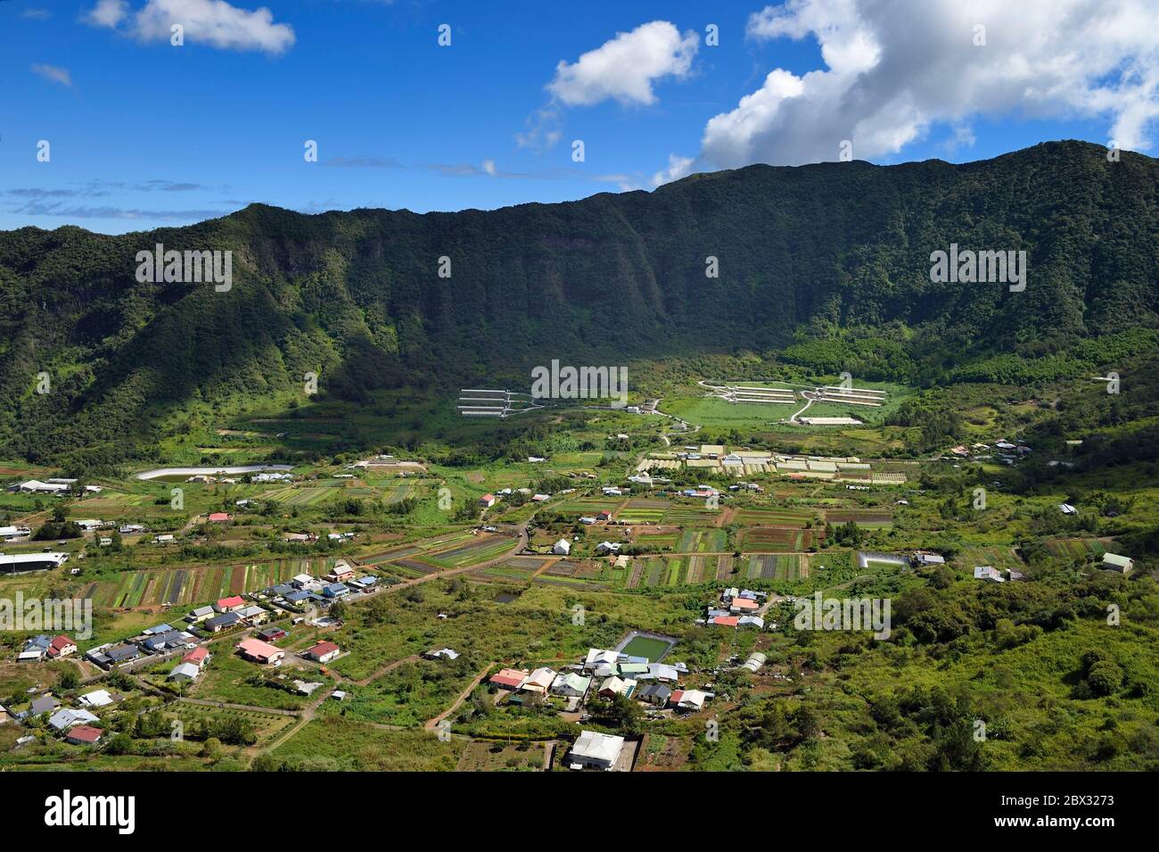 France, Reunion island (French overseas department), Reunion National Park listed as World heritage by UNESCO, La Possession, Roche Bouteille hike by the Cap Noir trail, the village of Dos d'Ane Stock Photo